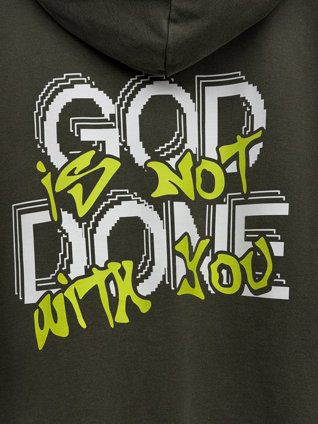 Two-color graffiti back print on olive hoodie