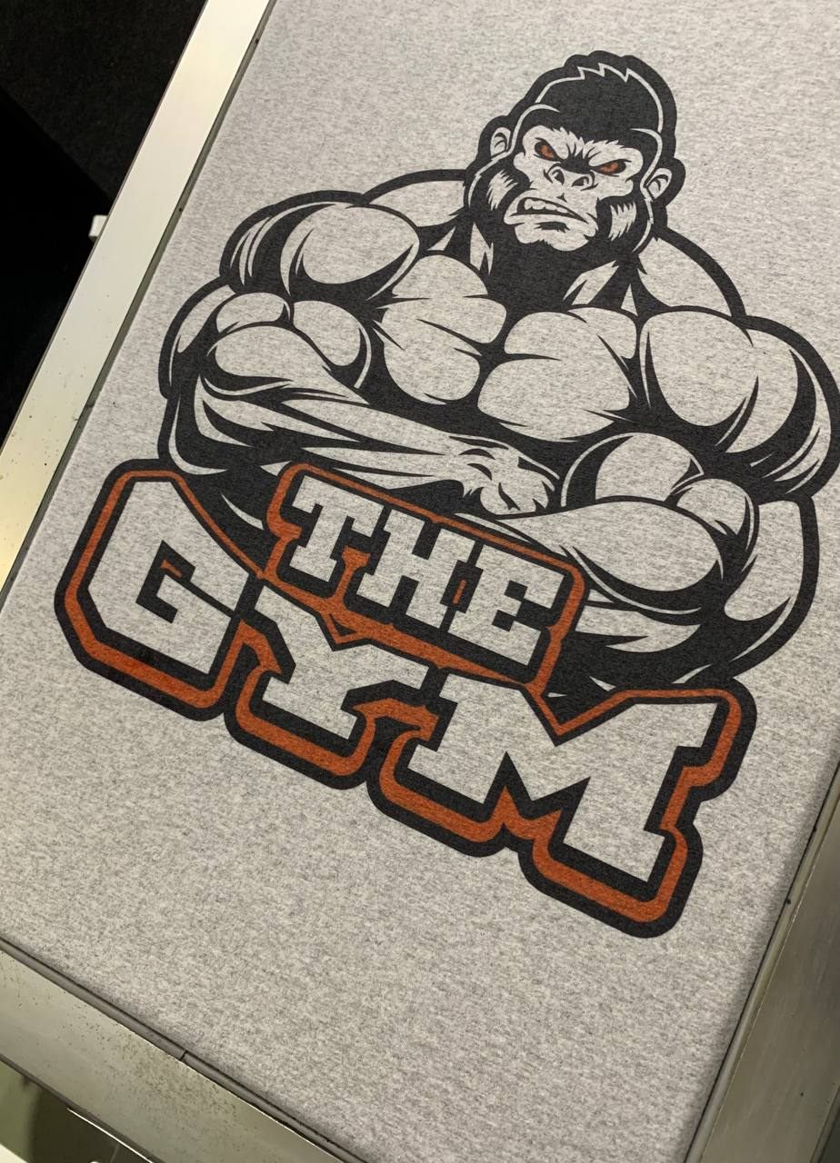 Gym mascot DTF print on heather grey tee