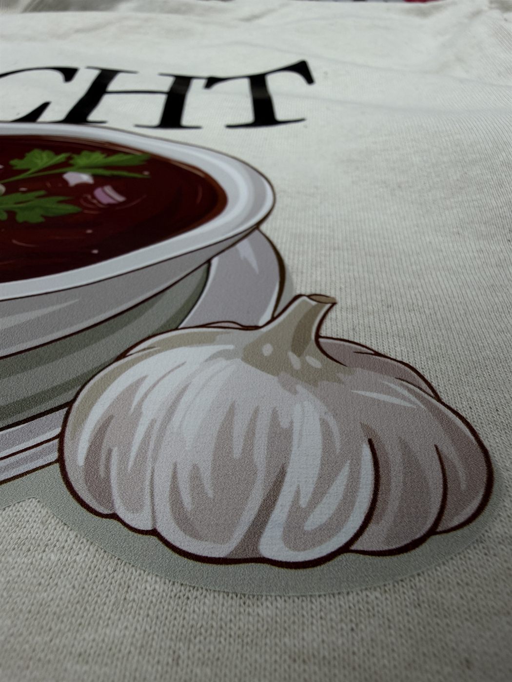 Illustrated borscht bowl print on cream tee