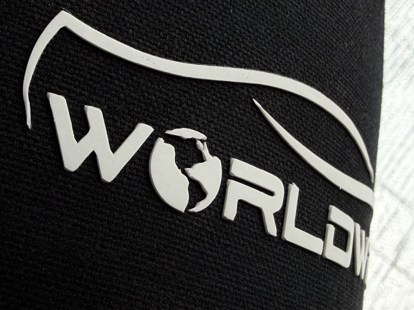 Fine-line white logo on black knit