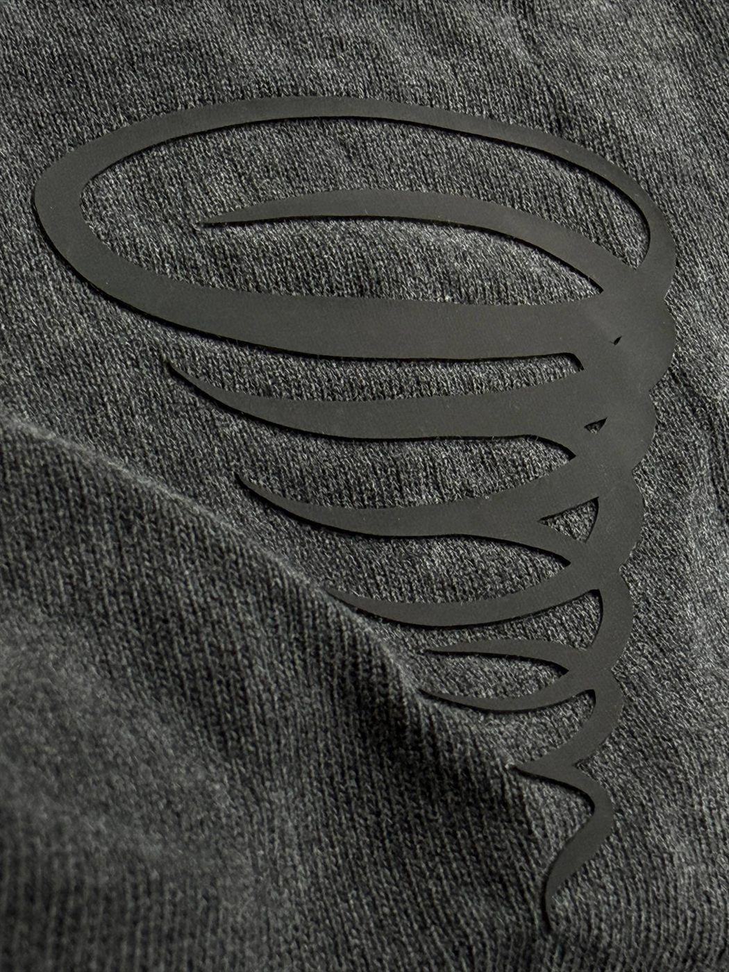 Tone-on-tone tornado mark on grey knit