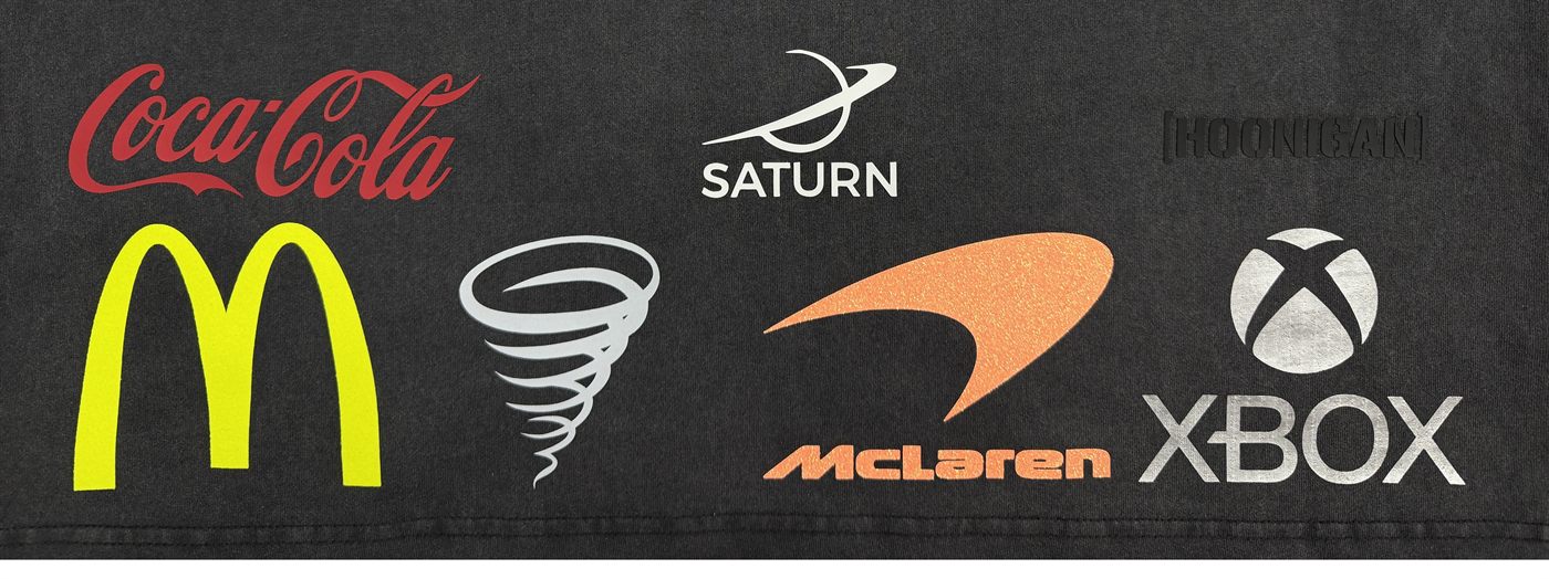Logo detail print samples on dark fabric